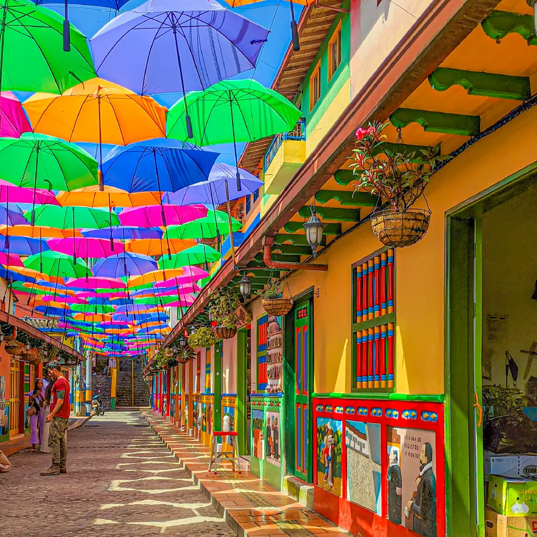 Calle del Recuerdo in Guatapé, covered in coloured umbrellas.